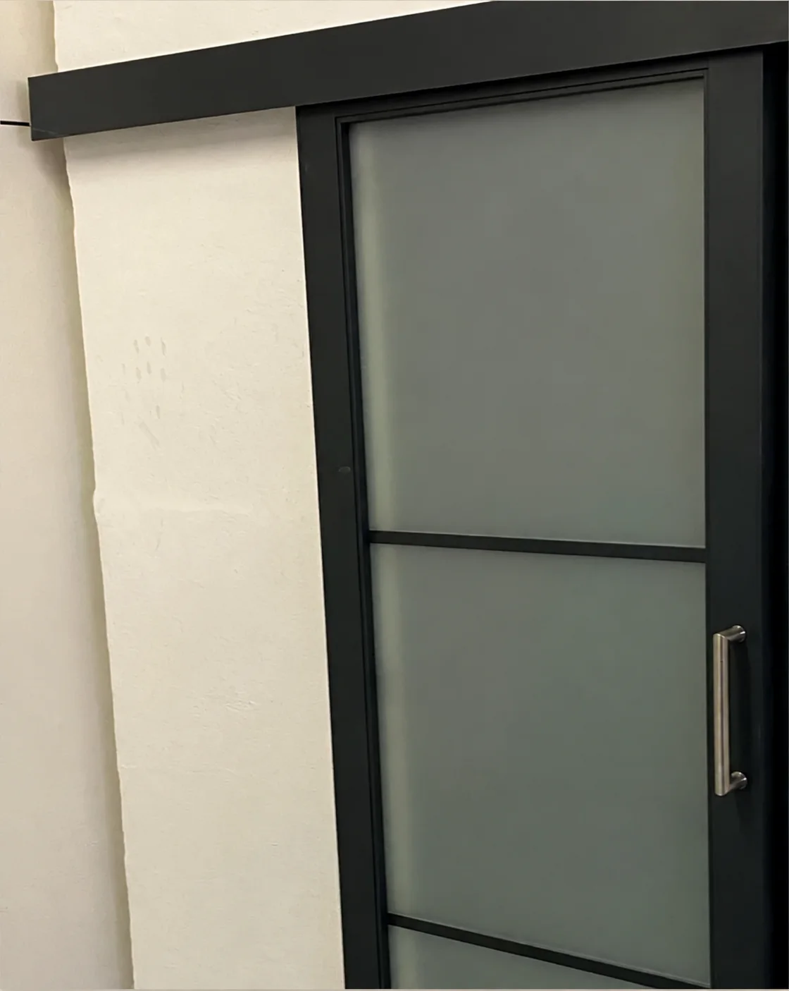 Puerta corredera interior de vidrio